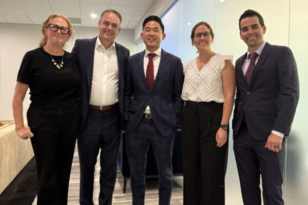 Long Island physicians, including Dr. Choi, Dr. Ledesma, and Dr. Catalanotto, engaging with legislators at the Suffolk County Medical Society Legislative Breakfast