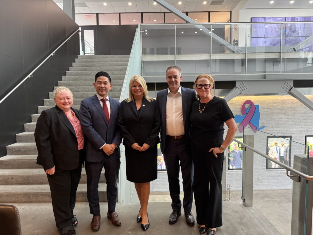Long Island physicians, including Dr. Choi, Dr. Ledesma, and Dr. Catalanotto, engaging with legislators at the Suffolk County Medical Society Legislative Breakfast