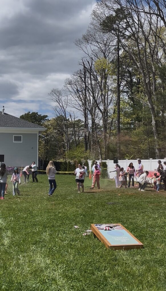 Screenshot Holi Festival of Colors event in Bay Shore sponsored by Spine Medicine & Surgery of Long Island