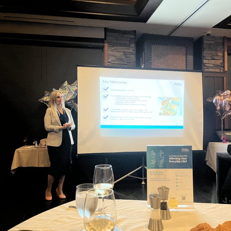 Dr. Antigone Argyriou presenting a Boston Scientific educational lecture on the Intracept Procedure and basivertebral nerve ablation.